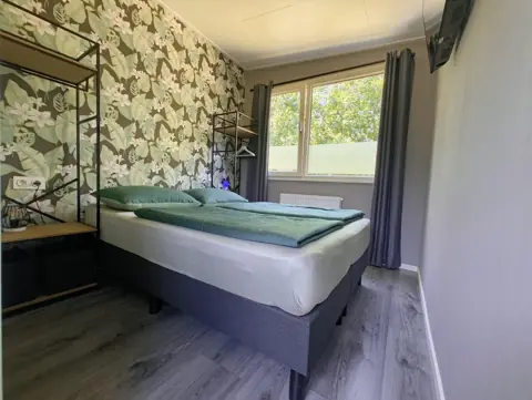 Slaapkamer met tweepersoonsbed
